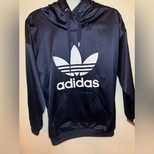 adidas navy blue pull over hoodie with logo.